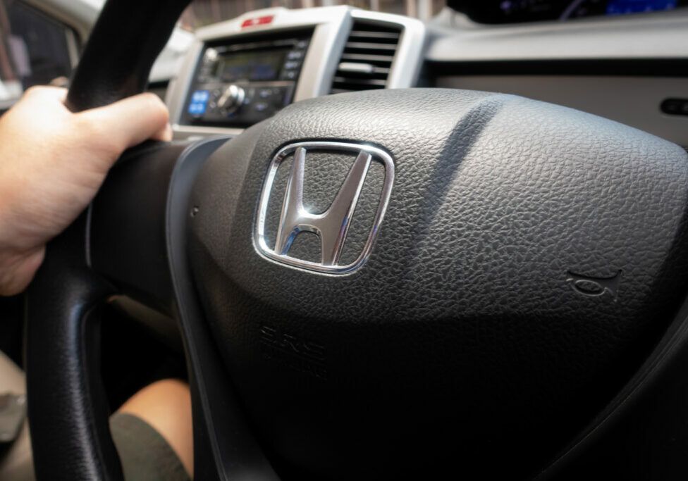 Honda Freed Black Steering Wheel with Honda logo.