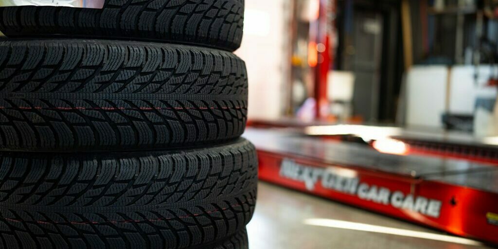 Stack of tires in Next Gen Car Care shop located in Clinton, NY.